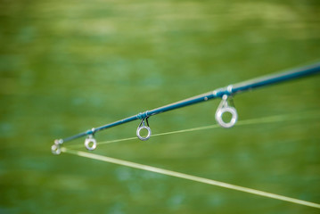 A fishing rod and water.