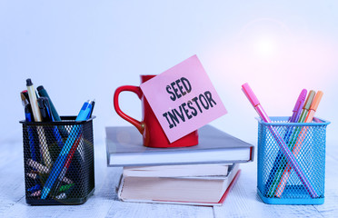 Word writing text Seed Investor. Business photo showcasing source of initial money required to...