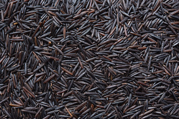 background of black wide vegan rice  texture for labels and Wallpaper