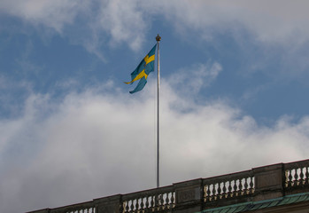The Swedish royal flagg, tronföljar flag, on the castle Stockholms slott.