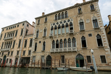 Fototapeta na wymiar Architecture and facade of the old city buildings of Venice