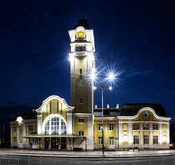 Obraz premium Night view of central trail station in Burgas sity with lights trail traffic.