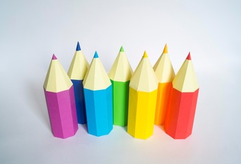 Pencil made of paper. The color of the rainbow.
