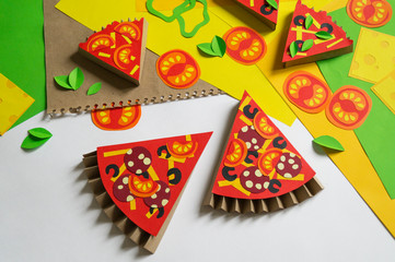 Pizza made of paper. Fast food.