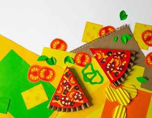 Pizza made of paper. Fast food.