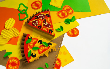Pizza made of paper. Fast food.