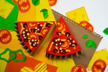 Pizza made of paper. Fast food.