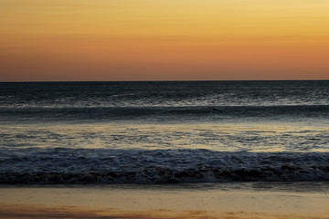 Beautiful aerial view of a sunset in  Naranjo Beach - Witch Rock Costa Rica