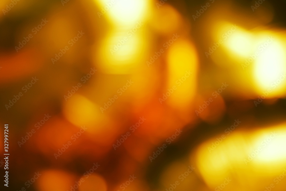 Wall mural gold sparkle glowing abstract blur background