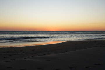 Beautiful aerial view of a sunset in  Naranjo Beach - Witch Rock Costa Rica