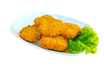 Tod Mun Pla, fried Fish Cake on dish Thai food , eaten with vegetables and sauce delicious with colors White background