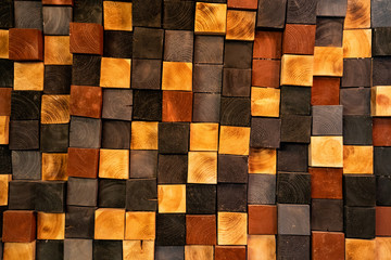 wooden cubes in different shades brown, background