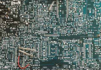 Chip green printed circuit board with the image of contacts