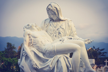La Pieta statue - The blessed Virgin Mary holding dead Jesus Christ body - obrazy, fototapety, plakaty