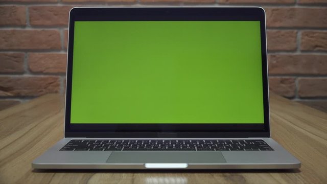 Laptop with green screen 12