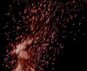 flame of fire with sparks on a black background