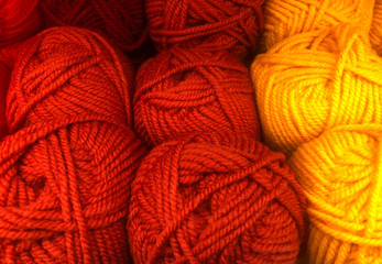 Wool clews colorful hobby background 