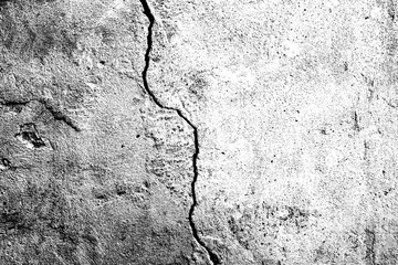 Texture of a concrete wall with cracks and scratches which can be used as a background