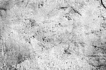 Texture of a concrete wall with cracks and scratches which can be used as a background