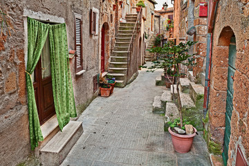 Fototapeta na wymiar Pitigliano, Grosseto, Tuscany, Italy: old alley in the ancient town
