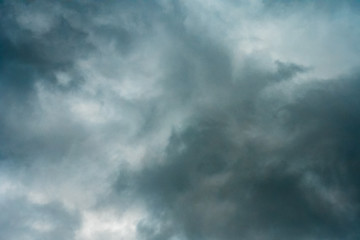 Dark clouds before rain. Dramatic grey cloud and thunderstorm.