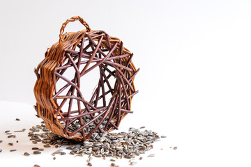close up of handicraft product natural wicker to put a sunflower seeds inside for a small birds.
