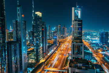 Fototapeta na wymiar Panorama of Dubai downtown at night from above, United Arab Emirates.