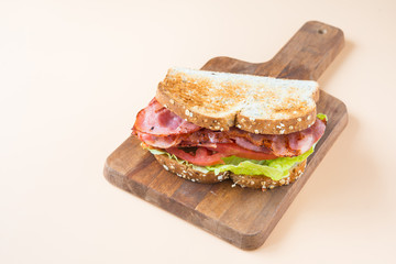 A BLT is a type of sandwich, named for the initials of its primary ingredients, bacon, lettuce and tomato