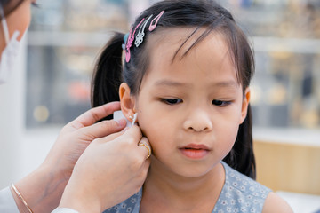 Ear piercing process
