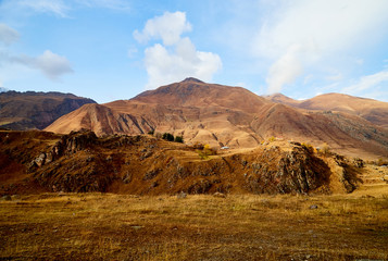 Autumn landscapes with fantastic views from mountain to valley. Colourful mountain nature in autumn, summer, or spring day