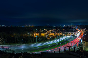 Fototapeta na wymiar Long exposure at night. light pullers from traffic light trails. Cars on the German Autobahn, Kassel
