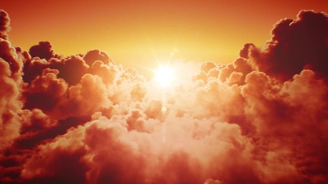 Beautiful Sunset in the Skies. Flying Over the Infinite Clouds with the Evening-Morning Sun Shining Bright Seamless. Looped 3d Animation with Sunset-Sunrise Over the Horizon. 4k Ultra HD 3840x2160