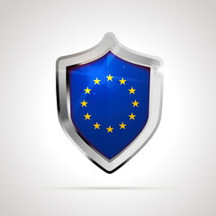European union flag projected as a glossy shield on a white background