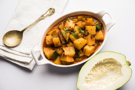 Kaccha Papita Sabji or Raw Papaya Sabzi, served in a karahi or bowl. selective focus