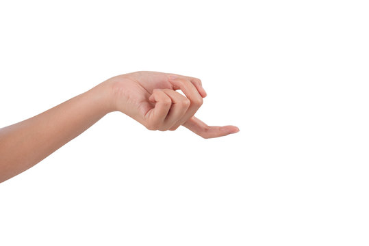 Beautiful female hand showing beckoning or carrying gesture, isolated on white background. Copy space gesturing with one finger, come here symbol.