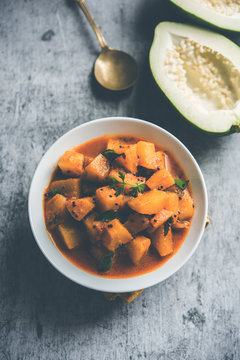 Kacha Papita sabzi with gravy or Raw Papaya curry Sabji , served in a bowl. selective focus