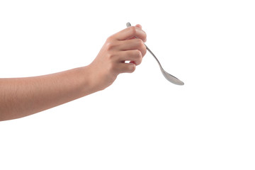 Close-up of woman's hand holding a tea spoon isolated on white background.