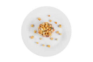 salad with beans, Korean carrots, cucumber, chicken, crackers on plate, white isolated background, view from above. For the menu, restaurant, bar cafe