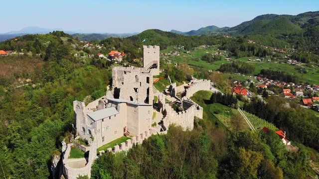 CELJE, SLOVENIA -Aerial view over a magnificent castle is standing on a hill.