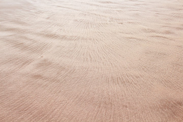 Brown sand beach patterns texture nature summer scenic background