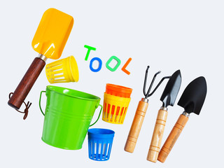Gardening tool set, cultivation equipment with green flower pot, shovel, rake isolated on white...