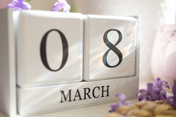 White infinite calendar on white background with 8 march date. International woman's day