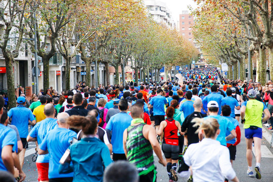 Maratón y gente corriendo