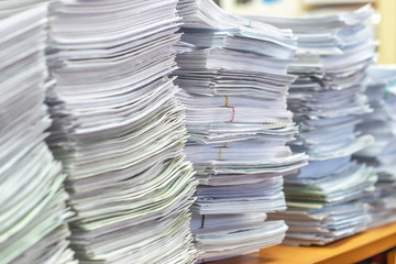 bundles bales of paper documents. stacks packs pile on the desk in the office