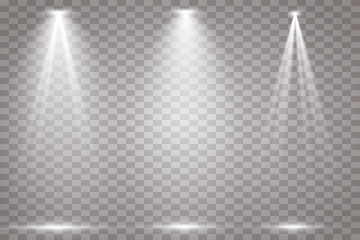 The spotlight shines on the stage. light exclusive use lens flash light effect. light from a lamp or spotlight. lighted scene. podium under the spotlight.