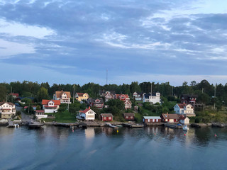 Vacation homes on island in Stockholm Archipelago Sweden, view from cruise ship