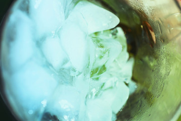 Ice cubes in a glass. Summer drink. Mojito