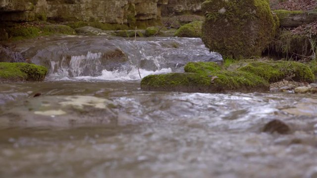 in the verena gorge in solothurn with beautiful little waterfalls leads to a destination where a christian hermit used to live