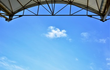 stadium canopy for spectators  cloud on blue sky background