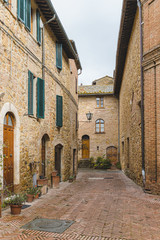 Walk on a rainy day through the streets of the beautiful town, Pienza, Tuscany
